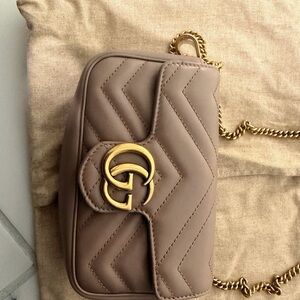 Gucci Marmont matelassé leather super mini bag